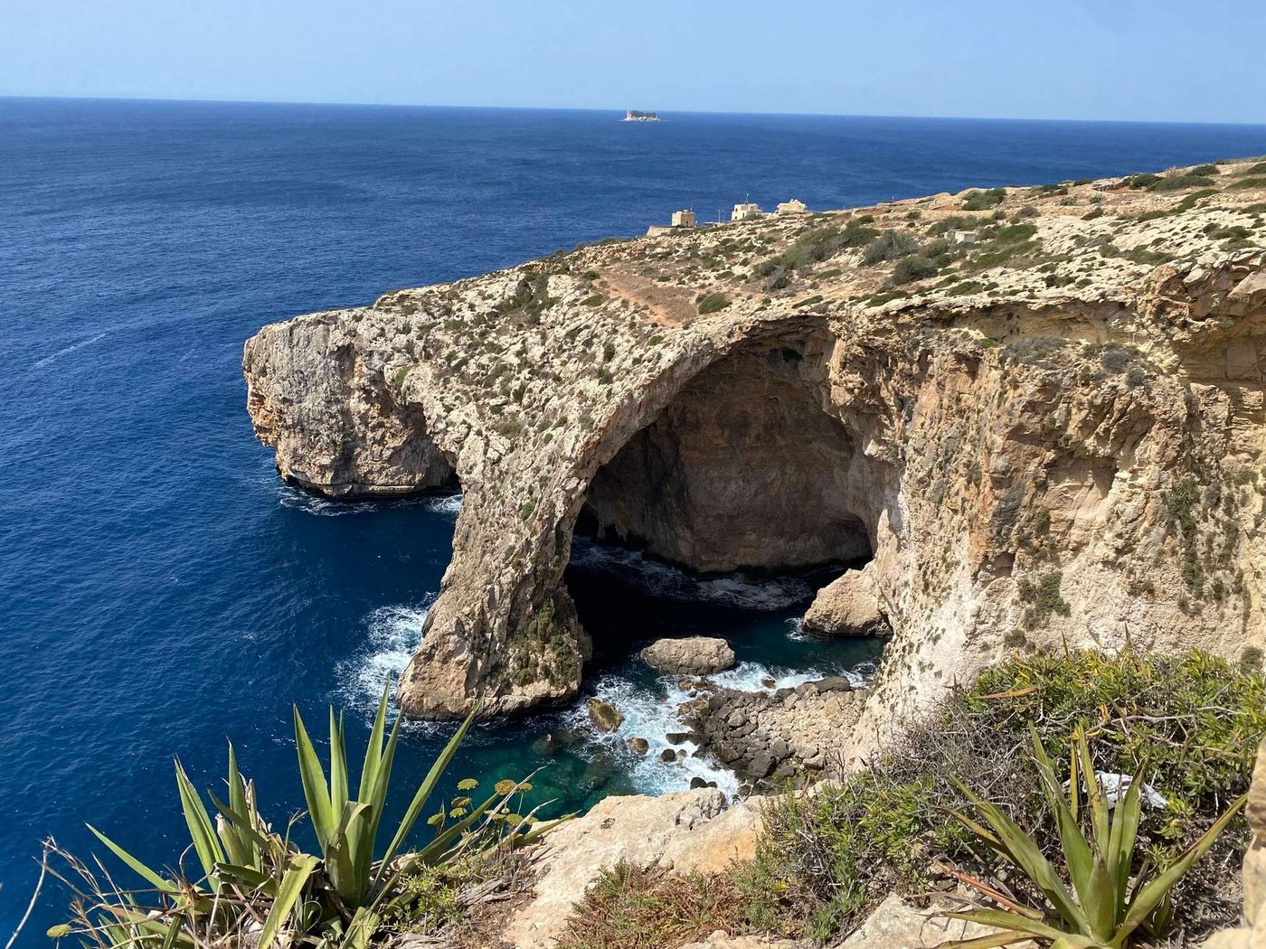 The Blue Grotto sea caves on the south coast — an optional stop on this day
